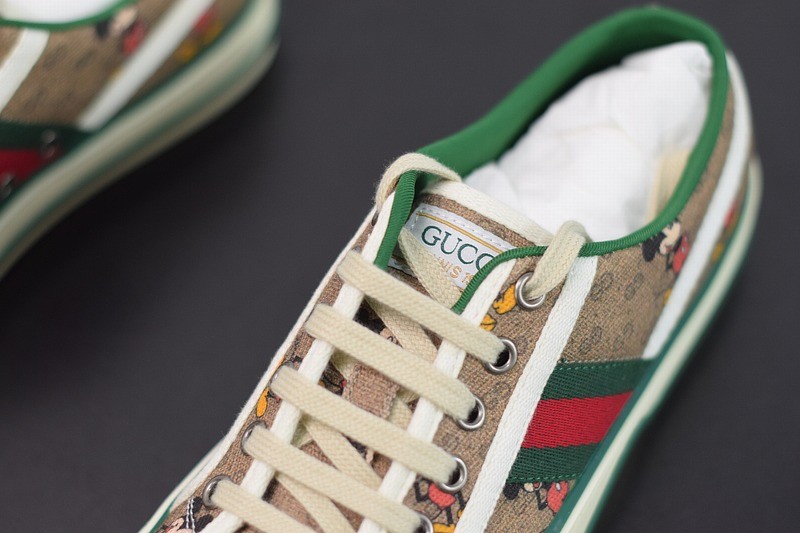 Men's Disney x Gucci Tennis 1977 sneaker with Web Men's Disney x Gucci Tennis 1977 sneaker with Web