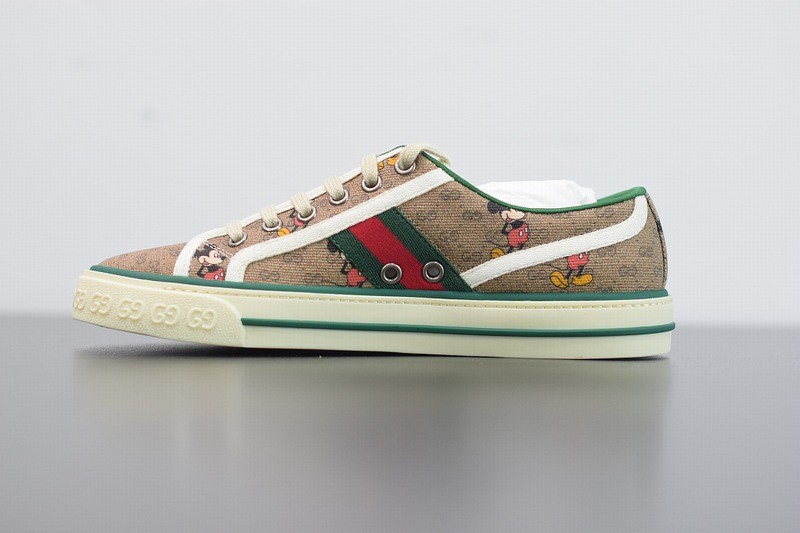 Men's Disney x Gucci Tennis 1977 sneaker with Web Men's Disney x Gucci Tennis 1977 sneaker with Web