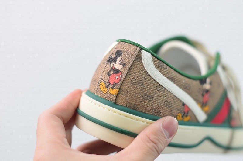 Men's Disney x Gucci Tennis 1977 sneaker with Web Men's Disney x Gucci Tennis 1977 sneaker with Web